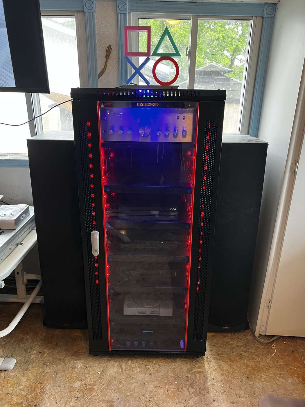 Finished PlayStation Ultimate unit with its doors closed and internal lighting on.
